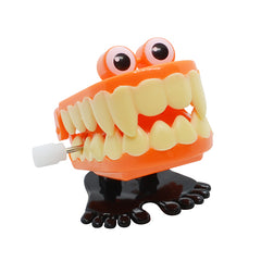 Juguete de cuerda en forma dentadura