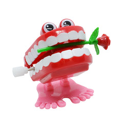 Juguete de cuerda en forma dentadura